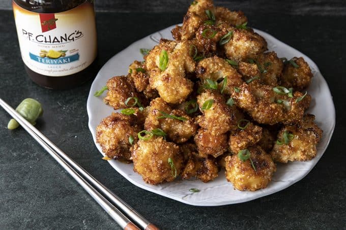 These incredible and incredibly simple, crunchy, baked Cauliflower Wings are sublimely sticky courtesy of the flavourful ginger and garlic teriyaki glaze.