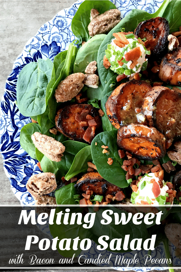 Melting Sweet Potato Salad: tender baby spinach salad with gorgeous, caramelized, deep orange melting sweet potato rounds, crumbled bacon, goat cheese crusted with more bacon and fresh chives, candied maple pecans, and an irresistible hot bacon vinaigrette dressing.