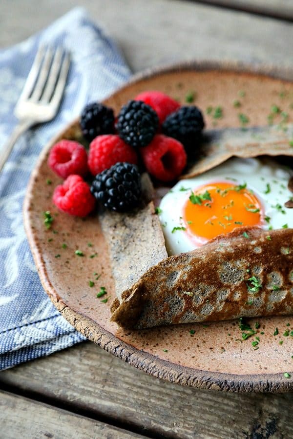 Pure Buckwheat Crepes are a classic staple of French cuisine: crispy edged, simple to make, and wonderful most especially wrapped around savoury ingredients, but great around sweet ones, too.