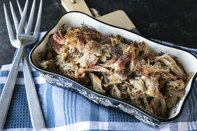 How to Cook Pork Shoulder in a smoker, instant pot, slow cooker, or dutch oven.