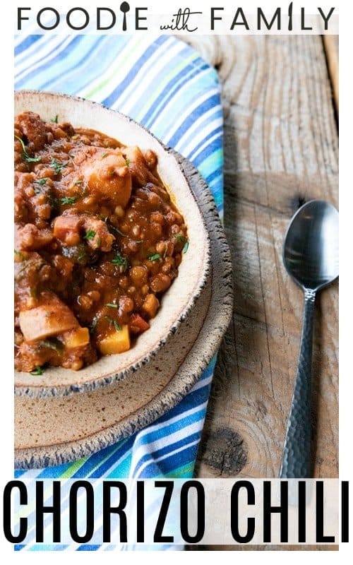 Chorizo Chili is hearty, spicy, slow-simmered chorizo in smoky tomato sauce with tender potatoes, carrots, and lentils. This is serious comfort food!