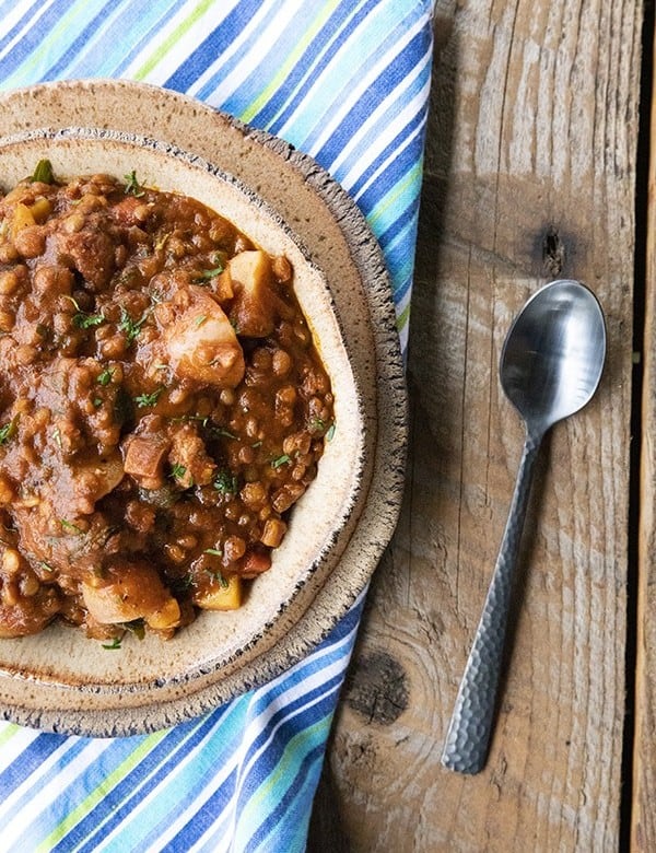 Chorizo Chili is hearty, spicy, slow-simmered chorizo in smoky tomato sauce with tender potatoes, carrots, and lentils. This is serious comfort food!