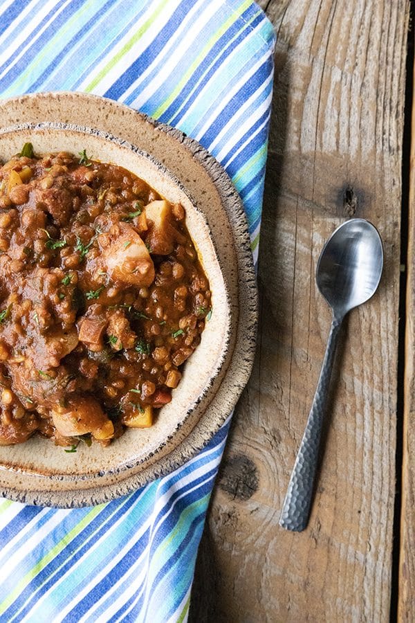 Chorizo Chili is hearty, spicy, slow-simmered chorizo in smoky tomato sauce with tender potatoes, carrots, and lentils. This is serious comfort food!