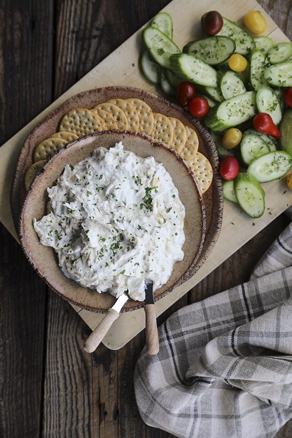 Warm, garlicky goat cheese fondue with tender pieces of marinated artichoke heart is perfectly dippable for crackers, vegetables, crusty bread, and pretzels, but it isn’t just a one-trick pony... When it’s room temperature or cold, it makes the most incredible spread for sandwiches. 