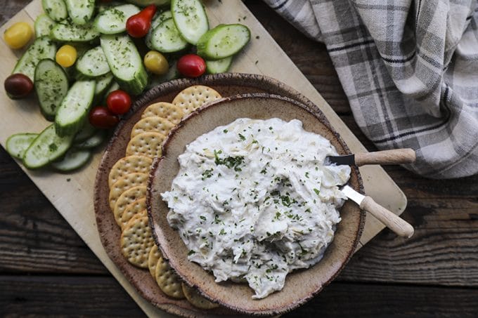 Warm, garlicky goat cheese fondue with tender pieces of marinated artichoke heart is perfectly dippable for crackers, vegetables, crusty bread, and pretzels, but it isn’t just a one-trick pony... When it’s room temperature or cold, it makes the most incredible spread for sandwiches. 