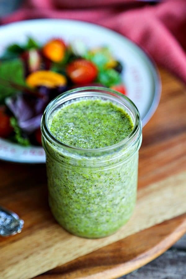 This 3-Ingredient Pesto Vinaigrette Recipe is by far my favourite dressing right now. It literally takes 3 ingredients and about 1 minute to make and delivers beautifully fresh basil, garlic, parmesan flavour to all your favourite salads. 