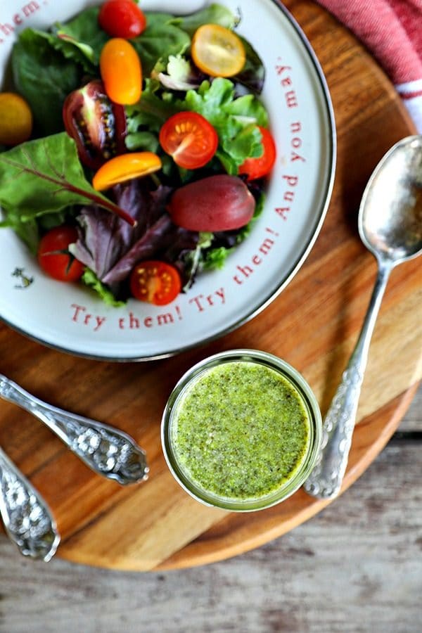 This 3-Ingredient Pesto Vinaigrette Recipe is by far my favourite dressing right now. It literally takes 3 ingredients and about 1 minute to make and delivers beautifully fresh basil, garlic, parmesan flavour to all your favourite salads.