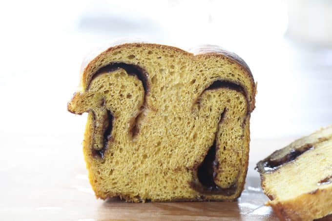 Pumpkin Cinnamon Swirl Bread is an irresistible golden-orange hued, soft, fine-crumbed bread with a decadent swirl of buttery cinnamon sugar.