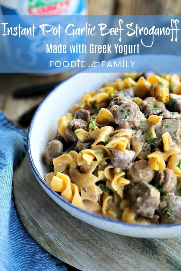 Instant Pot Garlic Beef Stroganoff: creamy, extra garlicky, mushroom and onion gravy enrobing tender beef cubes, with perfect pasta all cooked together in the Instant Pot. This has to be one of the most simple, crave-worthy comfort foods ever to be adapted to the world of electric pressure cookers.