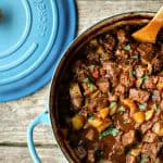 Curried Beef Oven Stew is filled with tender beef cubes, potatoes, carrots, & onions slow-cooked in a flavourful gravy made with soul-warming curry spices.