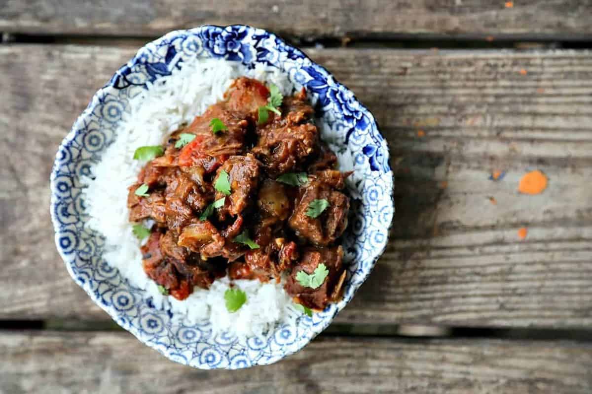 Curried Beef Oven Stew is filled with tender beef cubes, potatoes, carrots, & onions slow-cooked in a flavourful gravy made with soul-warming curry spices.