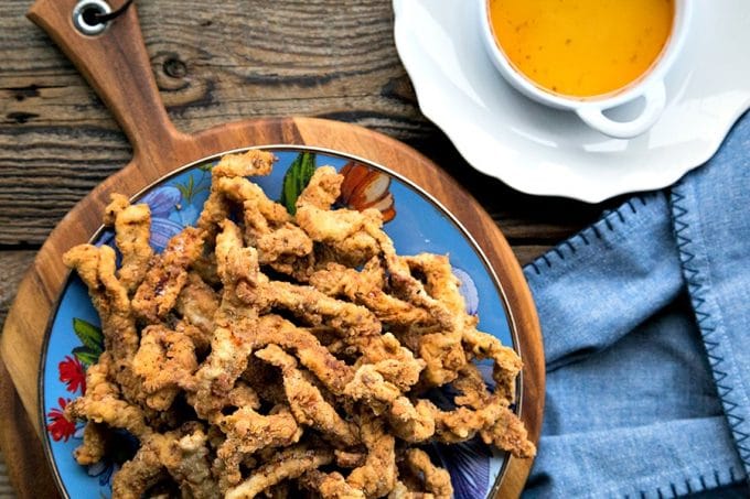 These Easy Crispy Pork Tenders or Pork Fries will be your new go-to snack. Make a huge pile of irresistible crispy-breaded pork from just two New York (boneless center cut) pork chops.
