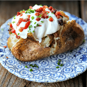 The Best Baked Potato is a thing of beauty. Our method best way to bake a potato yields a crisp, salty skin with fluffy insides every single time and is absolutely fool proof.