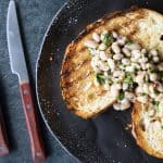 Full of fresh herb flavors, White Bean Salad comes together in a breeze. Made with canned or home cooked white beans, abundant fresh herbs, and a simple vinaigrette dressing, this salad is delicious as a light lunch on its own or as a side dish with all your favorite entrees. 